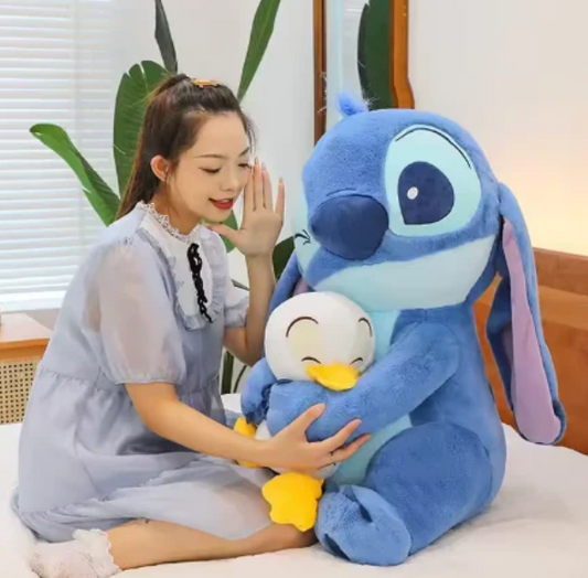 STITCH CON PATITO 75cm 💙